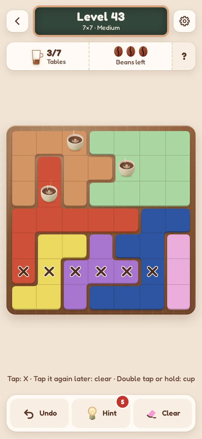 Brewdoku: een puzzel van 7 bij 7 met koffiekopjes op het bord